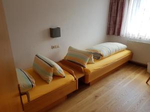Postel nebo postele na pokoji v ubytování Eckis Appartements