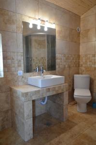 Kylpyhuone majoituspaikassa Vila Danly