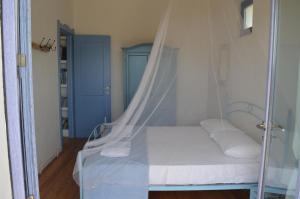 Ένα ή περισσότερα κρεβάτια σε δωμάτιο στο Casa Shezella