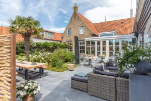 Posezení v ubytování De Herberg Appartementen