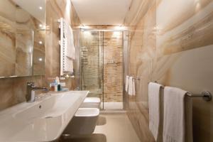 Vannituba majutusasutuses Stendhal Luxury Suites