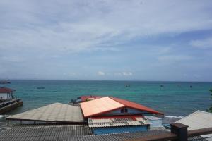 a view of the ocean with a pier and houses at Chill Days @ Koh Larn in Ko Larn