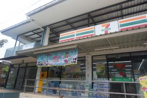 a store front of a store with signs on it at Chill Days @ Koh Larn in Ko Larn