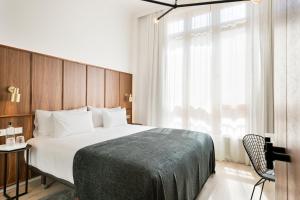 Postel nebo postele na pokoji v ubytování Yurbban Passage Hotel & Spa