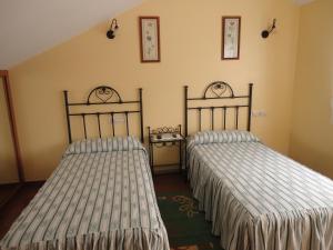 Postel nebo postele na pokoji v ubytování Casa Os Batans