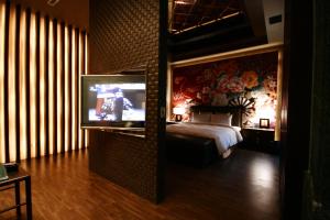 TV a/nebo společenská místnost v ubytování The Yorker Deluxe Motel
