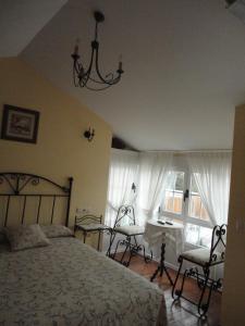 Postel nebo postele na pokoji v ubytování Casa Os Batans