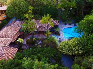 an aerial view of a resort with a swimming pool at Vilangelim Eco-Pousada in Imbassai