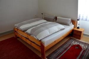 Postel nebo postele na pokoji v ubytování Villa Am Rosenfelspark