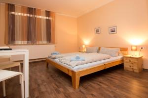 Postel nebo postele na pokoji v ubytování City Apartments Herne