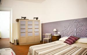 A bed or beds in a room at Trastevere Dream House