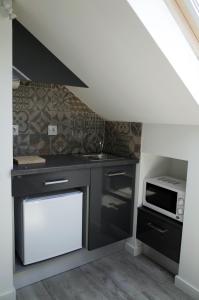 Ett kök eller pentry på Lisbon Beach Apartments 6