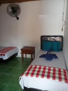 Ένα ή περισσότερα κρεβάτια σε δωμάτιο στο Izaac's Bed & Breakfast +37 φωτογραφίες