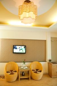 TV a/nebo společenská místnost v ubytování Venus Hotel Ha Noi