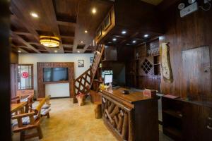 TV a/nebo společenská místnost v ubytování Tian Jia Xiao Yuan Boutique Homestay
