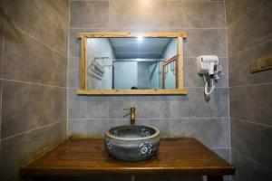 Un baño de Tian Jia Xiao Yuan Boutique Homestay