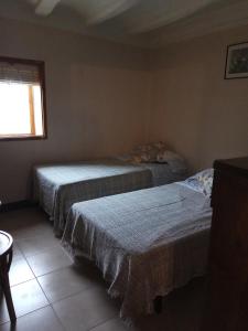Ένα ή περισσότερα κρεβάτια σε δωμάτιο στο Cal Estevet