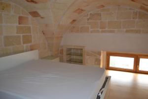 Postel nebo postele na pokoji v ubytování Le Terrazze B&B Manduria
