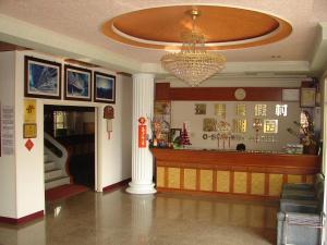 The lobby or reception area at O-Sun-Win Hotel
