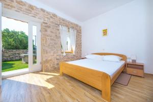 Postel nebo postele na pokoji v ubytování Holiday home Ana national park Krka