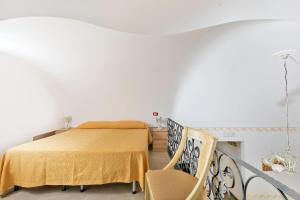 Posteľ alebo postele v izbe v ubytovaní Capri Dreaming