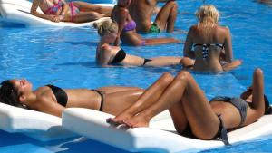 a group of people in the swimming pool at Pleasure Apartment near center of Odessa in Odesa