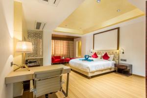 Hotel Abika Elite客房内的一张或多张床位