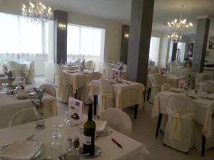 A restaurant or other place to eat at Hotel Explorer