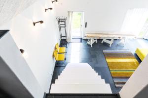 Posezení v ubytování Studio på loftet i två plan