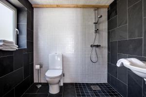 Koupelna v ubytování Studio på loftet i två plan
