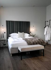 Postel nebo postele na pokoji v ubytování Hotel Vestmannaeyjar + 21 fotografií
