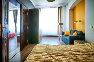 Posteľ alebo postele v izbe v ubytovaní Apartamenty Kowary - Na Kowarskiej Starówce