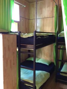 Palanda nebo palandy na pokoji v ubytování Homestay Hoang Vy