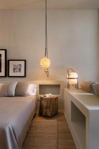 Posteľ alebo postele v izbe v ubytovaní Hotel Peralada Wine Spa & Golf