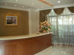 Area lobi atau resepsionis di Ladoll Service Apartments