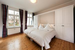 Кровать или кровати в номере Haus Grahl