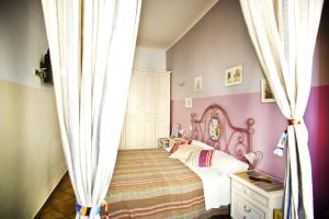 A bed or beds in a room at Trastevere Dream House