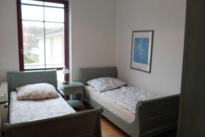 Ein Bett oder Betten in einem Zimmer der Unterkunft Haus Lucie
