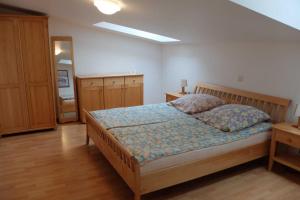 Ein Bett oder Betten in einem Zimmer der Unterkunft Haus Lucie