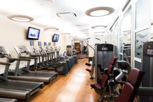 a gym with cardio machines and treadmills at The Royal Yacht in Saint Helier Jersey
