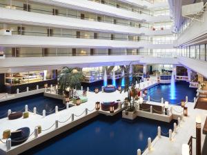 an overhead view of a hotel lobby with a pool at Sheraton Okinawa Sunmarina Resort in Onna
