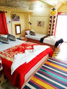 Ένα ή περισσότερα κρεβάτια σε δωμάτιο στο Hotel Paradise