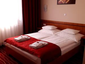 Postel nebo postele na pokoji v ubytování Diana Club Hotel