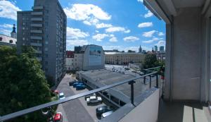 Budova, v ktorej sa apartmán nachádza + 12 fotografií