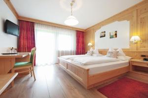 Ένα ή περισσότερα κρεβάτια σε δωμάτιο στο Mountain B&B - La Scalira