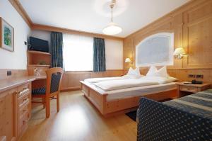 Ένα ή περισσότερα κρεβάτια σε δωμάτιο στο Mountain B&B - La Scalira
