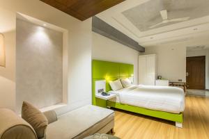 Hotel Abika Elite客房内的一张或多张床位