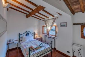 Postel nebo postele na pokoji v ubytování Casa il Castello