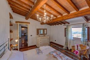Postel nebo postele na pokoji v ubytování Casa il Castello