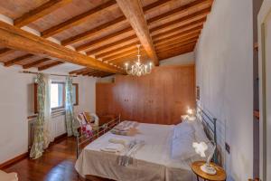 Postel nebo postele na pokoji v ubytování Casa il Castello